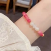 Fresco y de moda ligero diseño de lujo sentido doble concha cuatro hojas pulsera de flores para el viaje diario universal de alta calidad accesorios de mano Specification image
